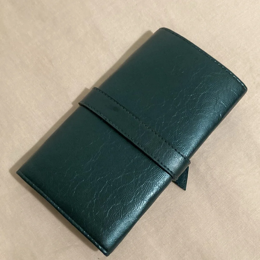 Mele & Co jewelry roll travel case teal blue
